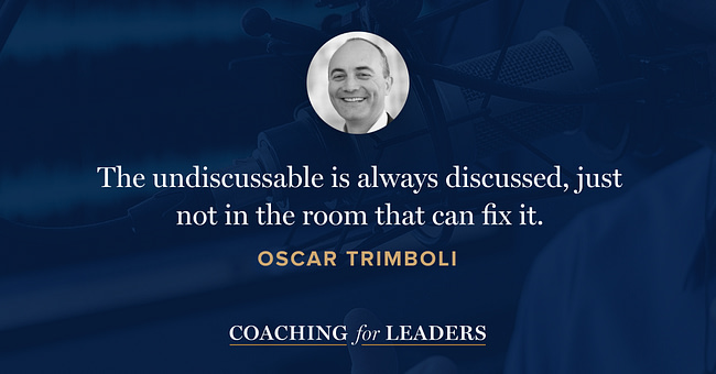 The undiscussable is always discussed, just not in a room that can fix it.