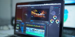 laptop showing video editing on a timeline