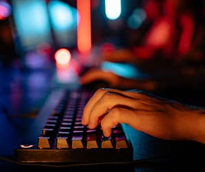 Person typing on a keyboard